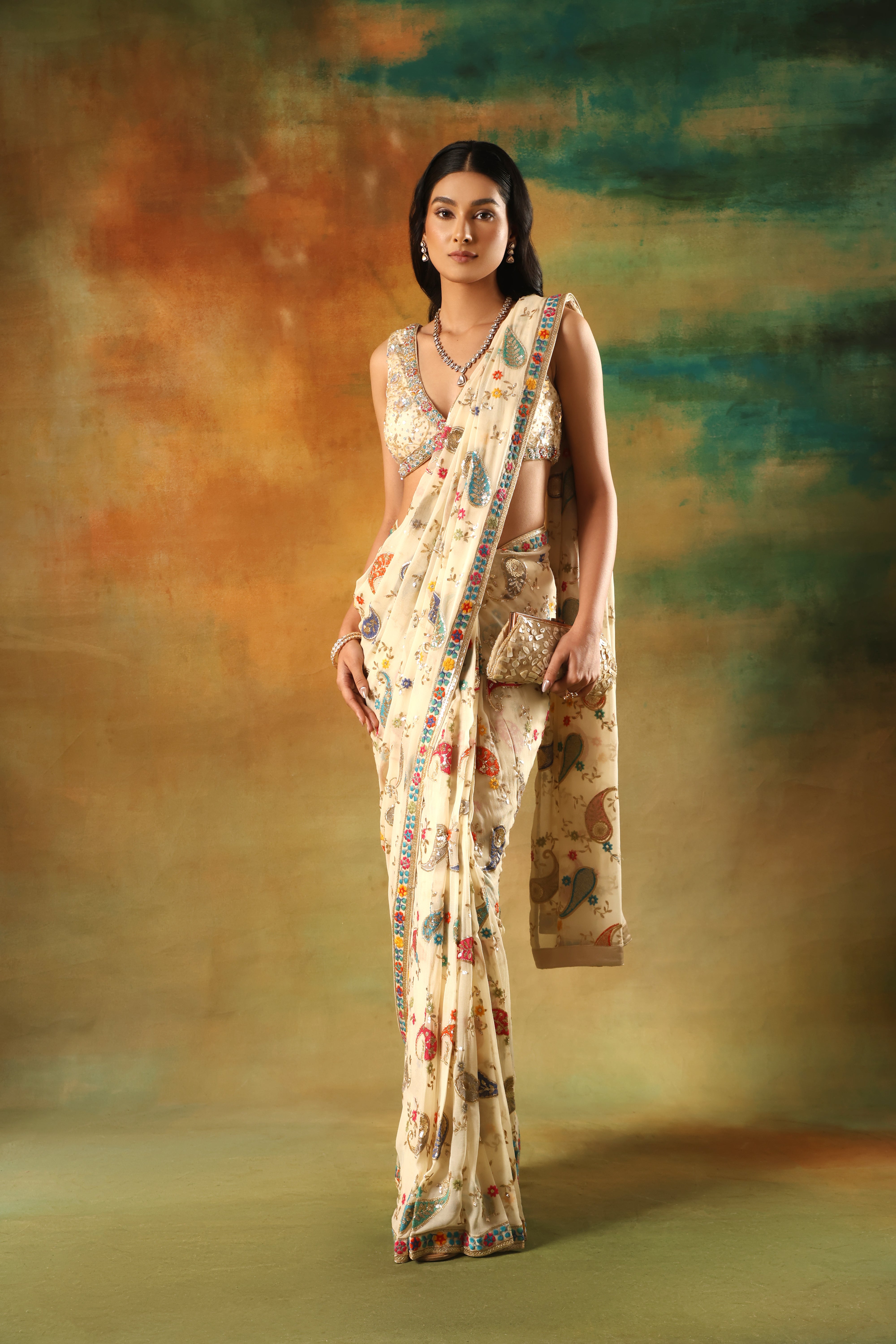 Ivory Embroidered Saree & Embellished Blouse
