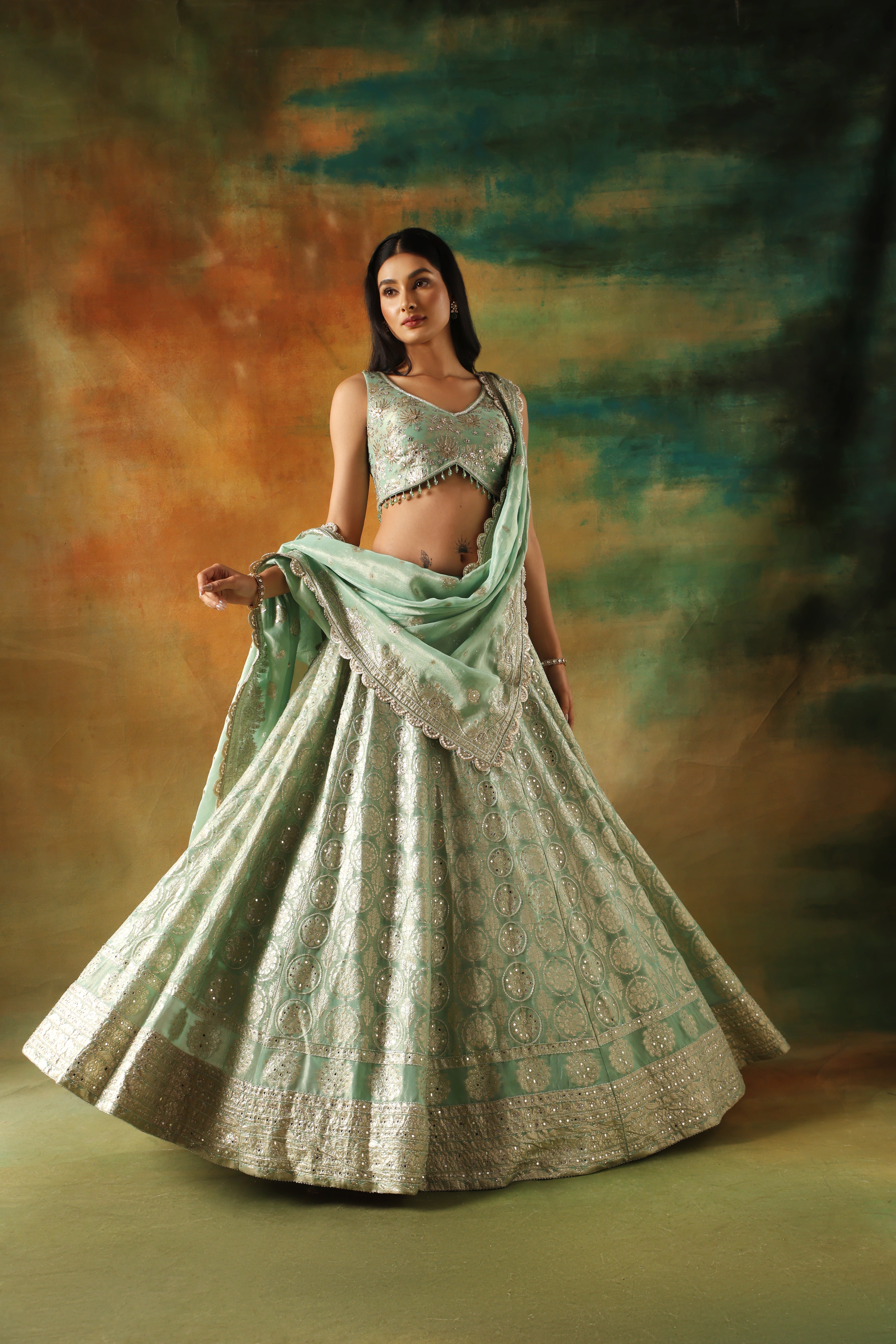 Sea green tissue jacquard lehenga choli for weddings and festivals