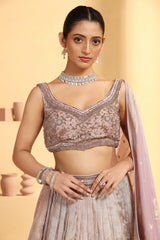 Nakshi and sequin work choli with a cutwork Tissue Lehenga