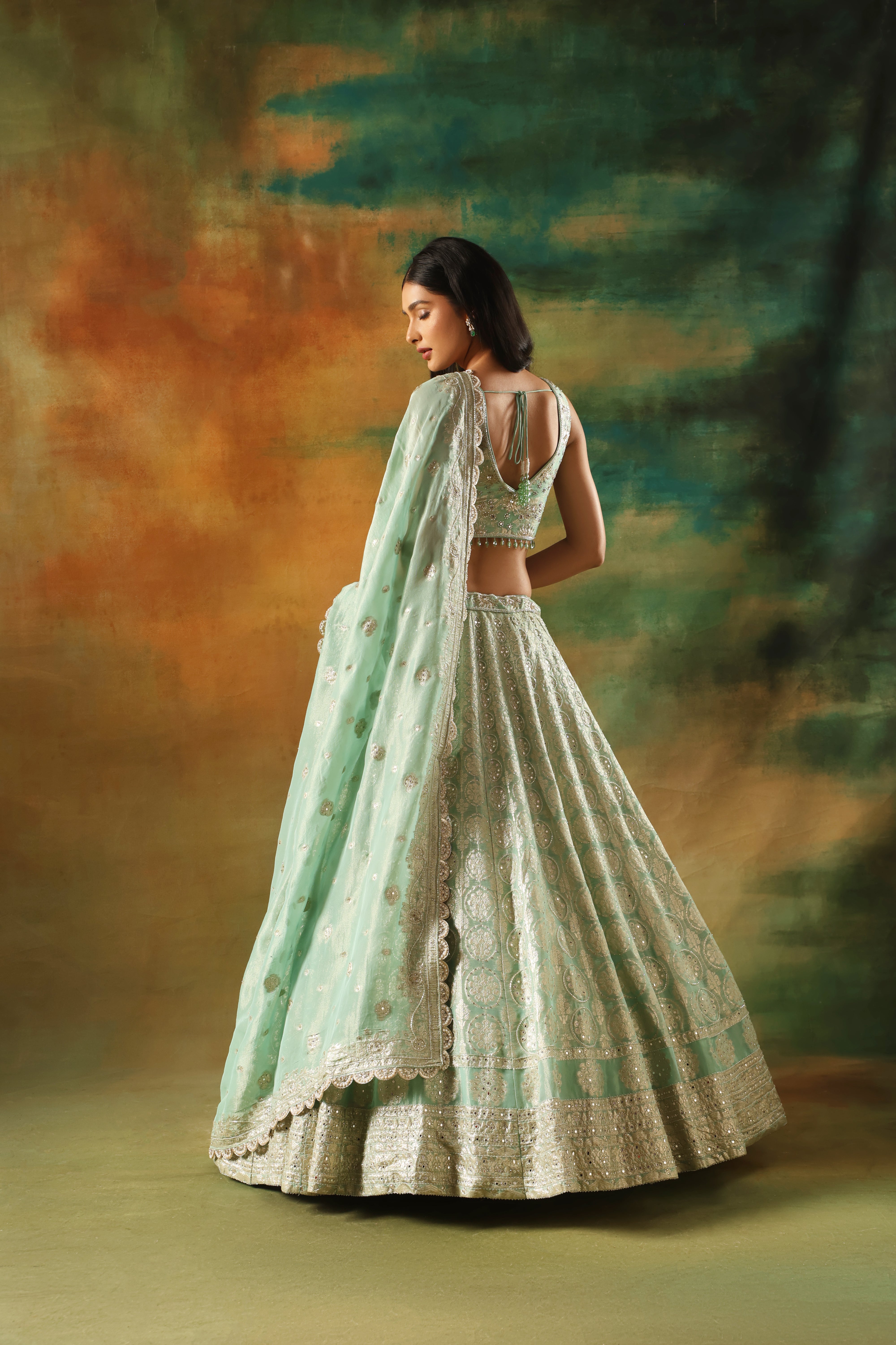 Sea green tissue jacquard lehenga choli for weddings and festivals