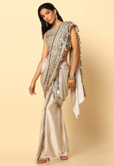 Stylish Gold Saree in Shimmer Fabric with Glass Beads Blouse.