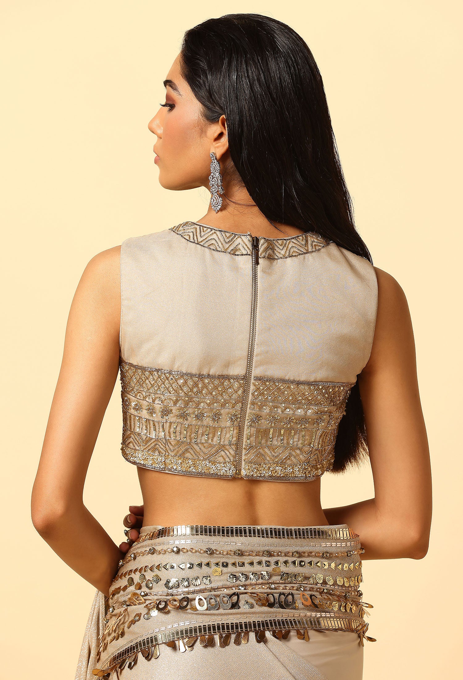 Stylish Gold Saree in Shimmer Fabric with Glass Beads Blouse.