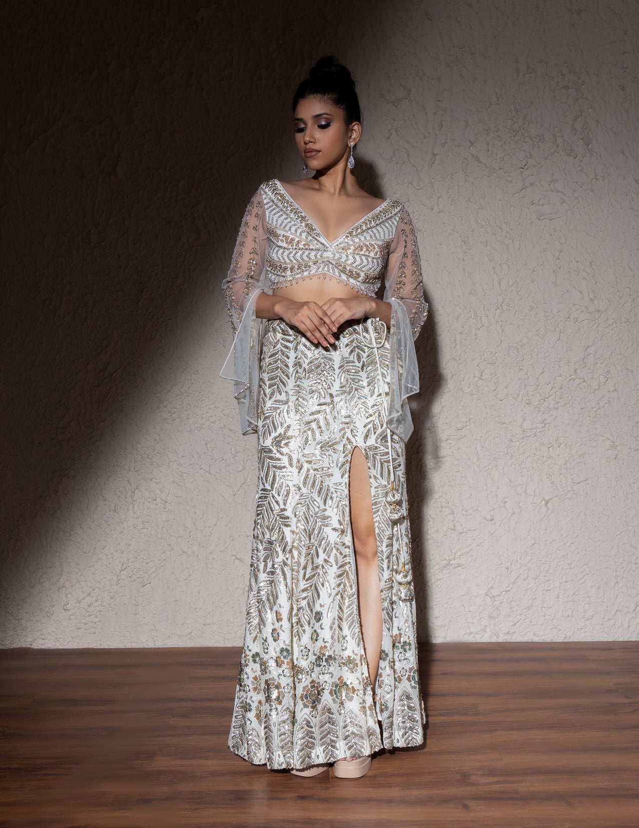 Ivory Net Hand Embroidered Cut Dana And Sequin Leaf Skirt & Blouse Set