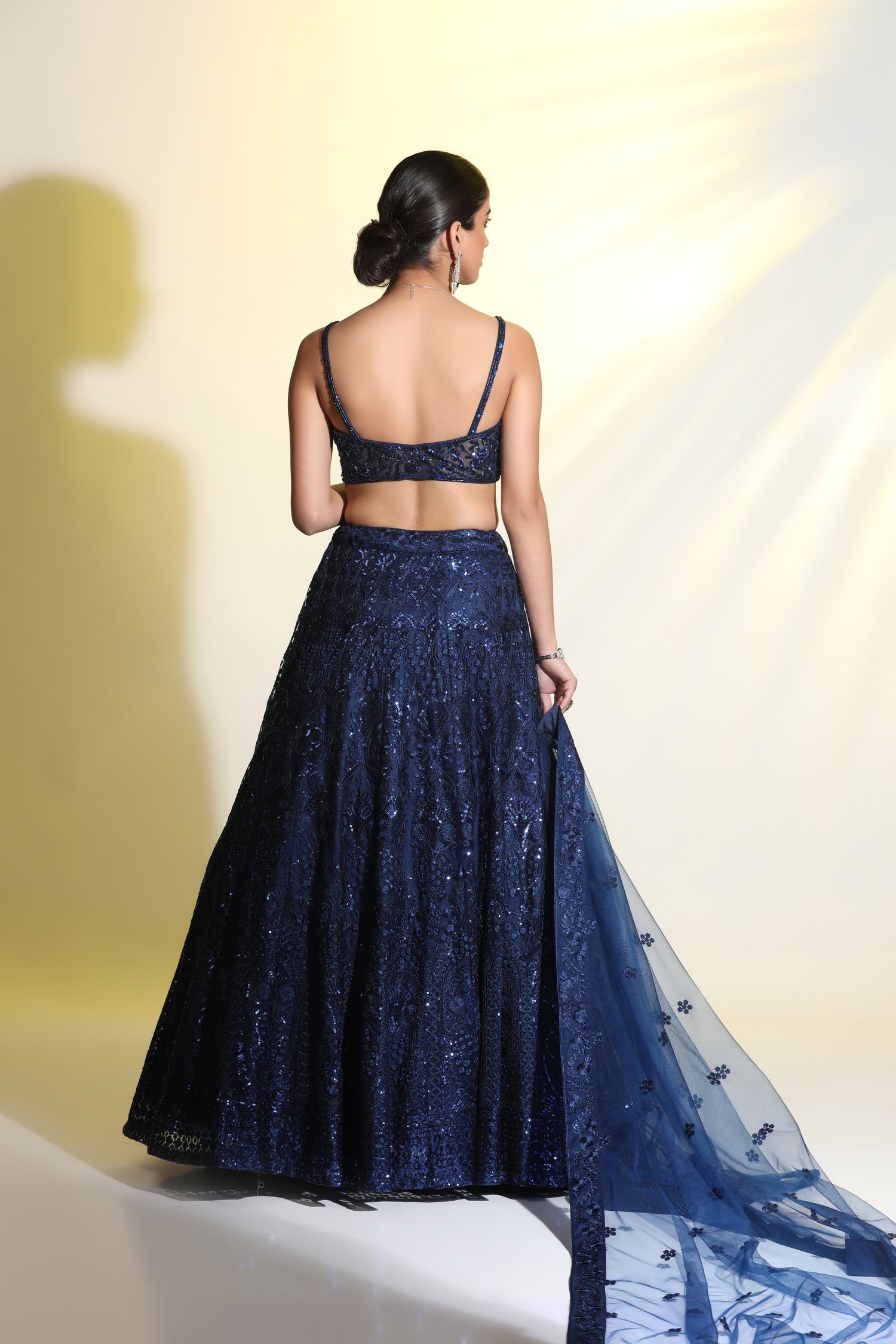 A Lehenga adorned with sequined and cutdana