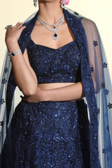 A Lehenga adorned with sequined and cutdana