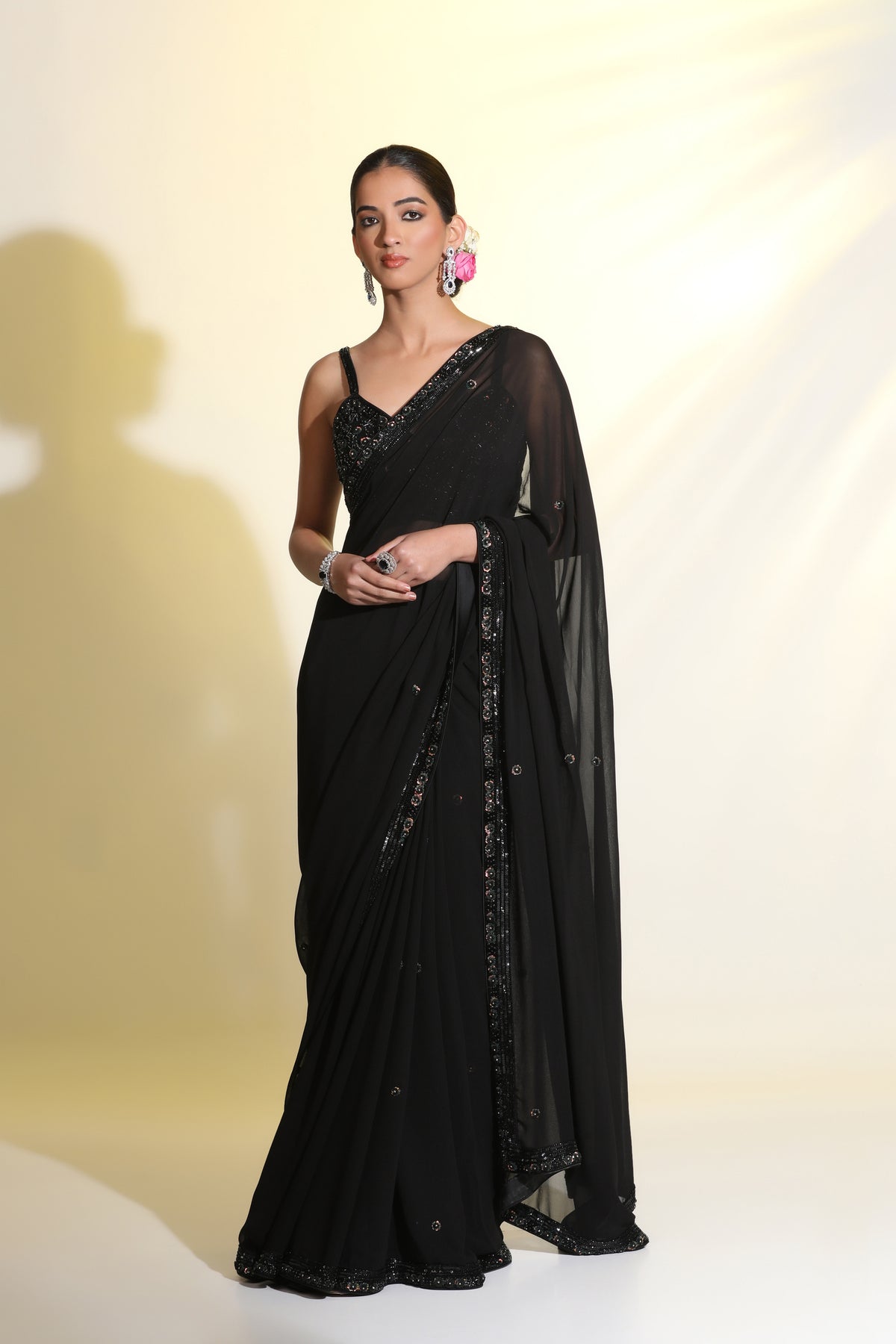 Black sequin cutdana hand embellishment sling border border saree choli.