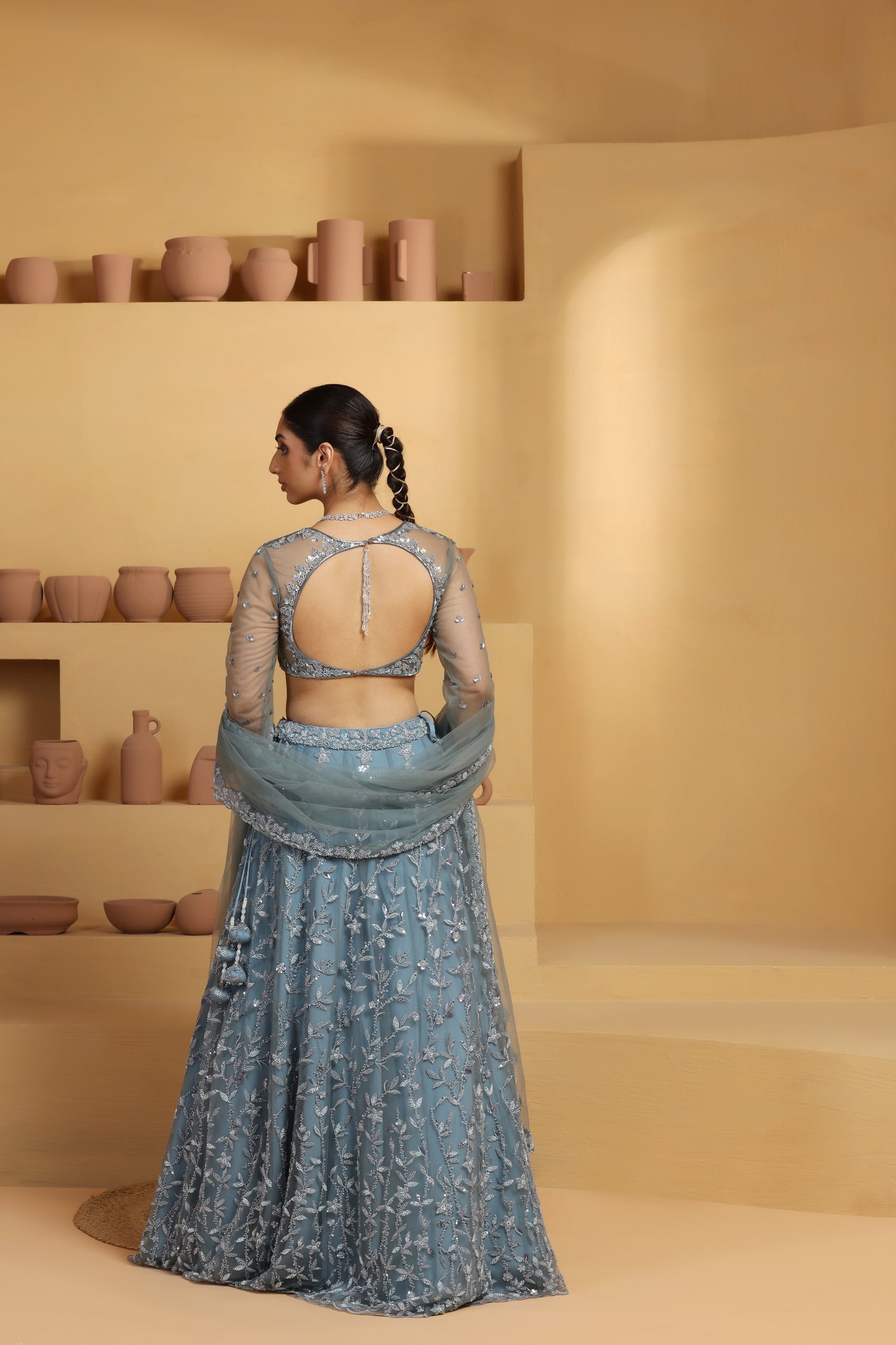 Net Flower motif kalidar Lehenga with geomatric choli.