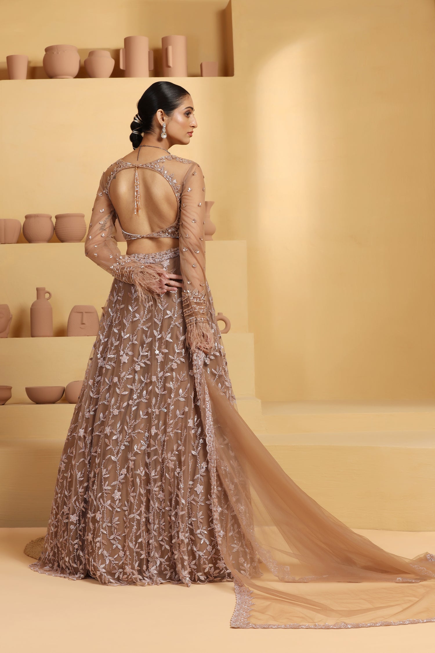 Net Flower motif kalidar Lehenga with geomatric choli.