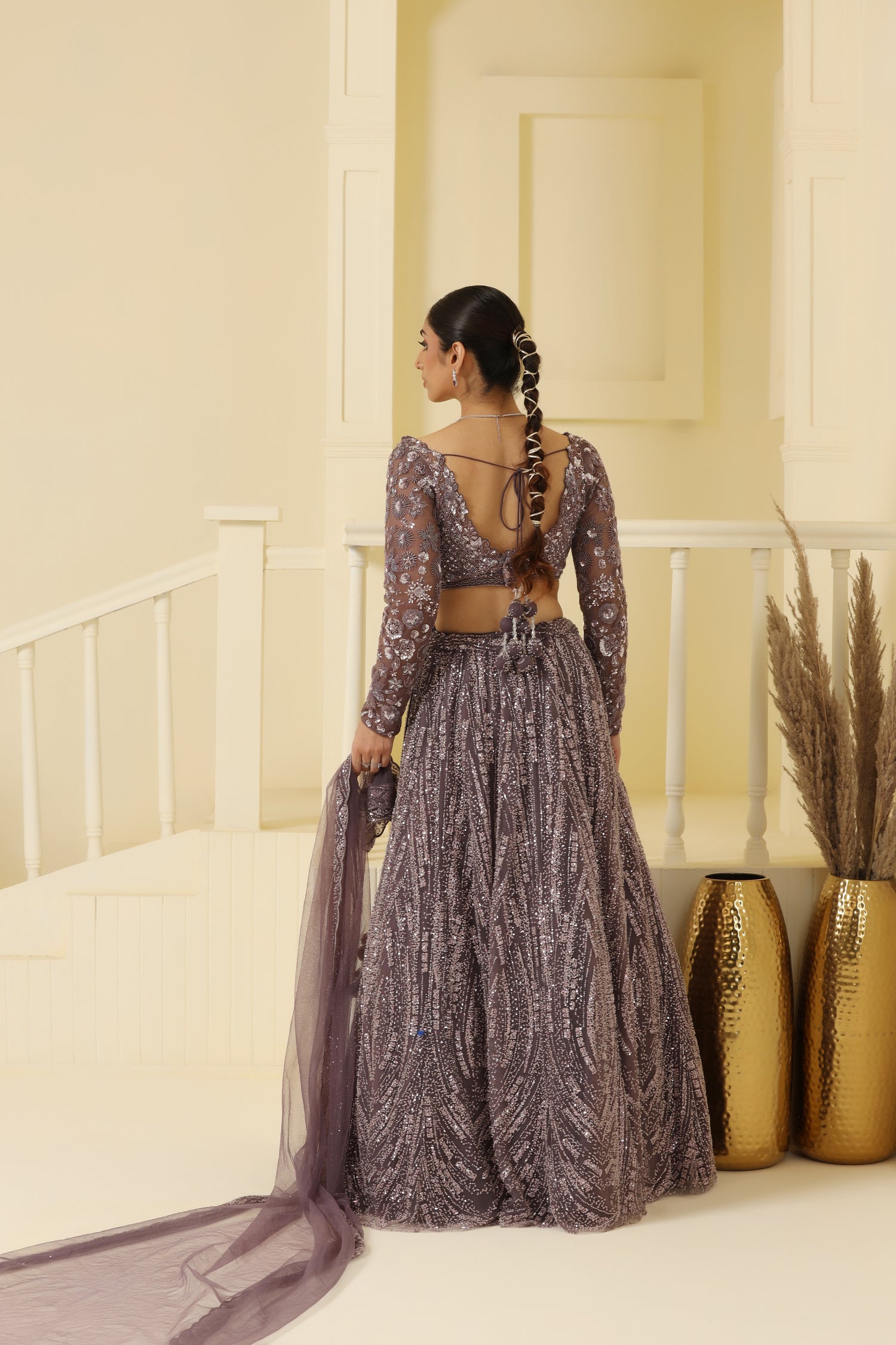 Net Kalidar cutdana and beads work Lehenga set.