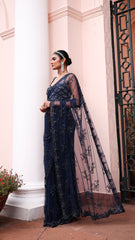 Exquisite royal blue saree with sparkling floral details and intricate beadwork.