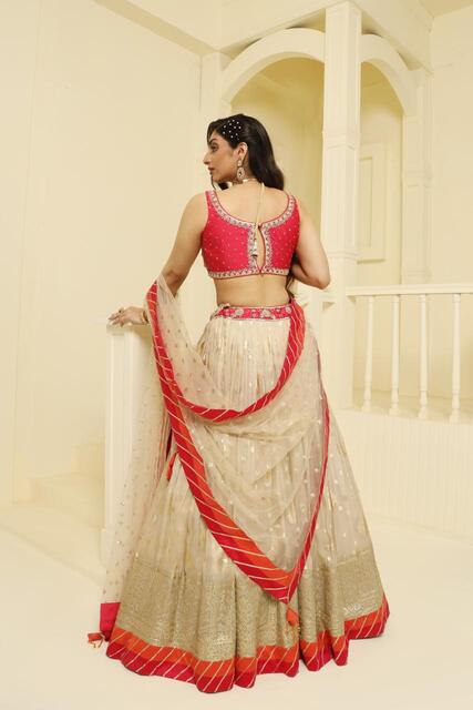 Magenta and orange embroided Tissue lehenga set